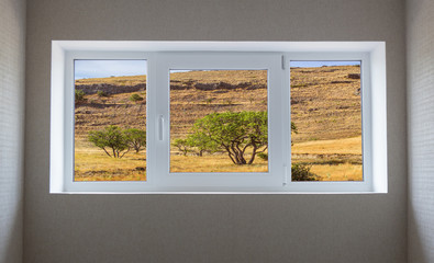 Window view of a beautiful mountain landscape