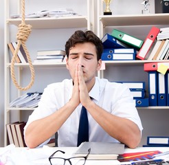 Busy frustrated businessman angry in the office