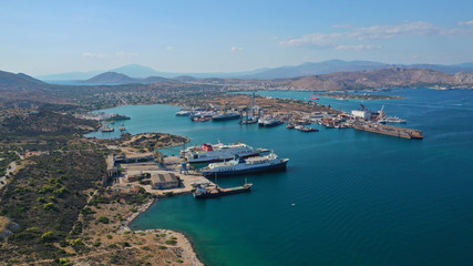 Fototapeta na wymiar Aerial photo of industrial old shipyard repairing small boats in Mediterranean port