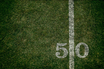 American Football 50 yard line football field and game