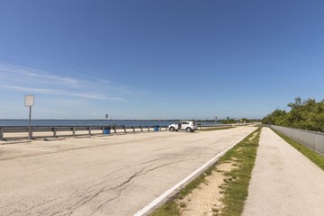Beautiful landscape view of bridge highway to Key West,  Florida. USA. Blue water of Atlantic ocean...