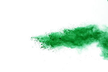 Fototapeta na wymiar Green powder explosion on white background.