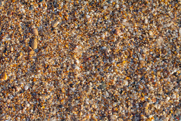 sea pebbles colored granite on the beach