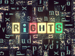 The word Rights as neon glowing unique typeset symbols, luminous letters rights