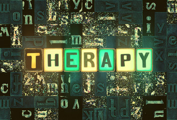 The word Therapy as neon glowing unique typeset symbols, luminous letters therapy