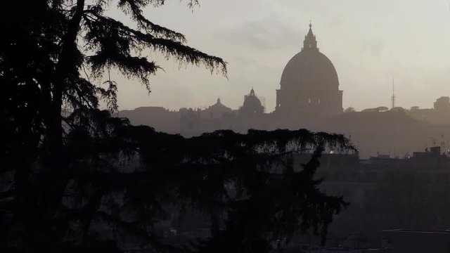 Rome city view from Villa Borhgese park with windy trees and cloudy buildingson stormy evening. Royalty free Full HD stock footage related to Italian, European life, travel, culture. weather..