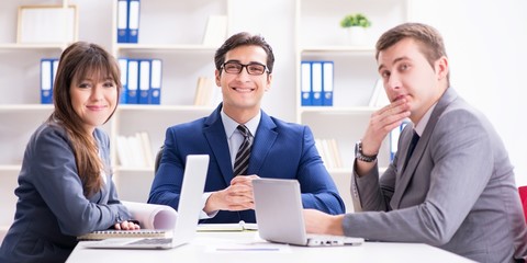 Business meeting with employees in the office