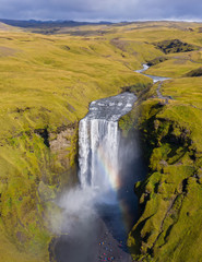 Iceland waterfall Skogafoss in Icelandic nature landscape. Famous tourist attractions and landmarks...