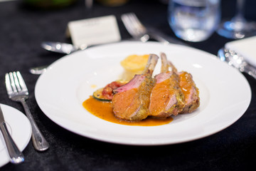 Lamb chops on beautiful dining table