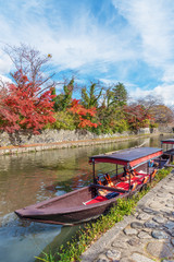 Tourist sightseeing boat in Hachiman-bori canal in Omihachiman, Japan