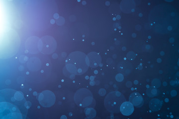 Abstract Blue bokeh defocus glitter blur background.