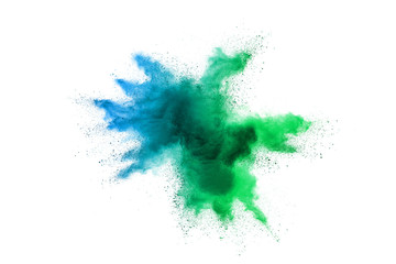 Freeze motion of colorful color powder exploding on white background.  Paint Holi.