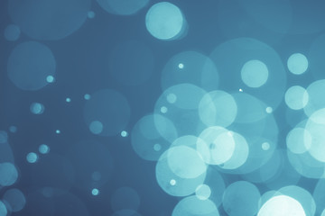 Abstract Blue bokeh defocus glitter blur background.