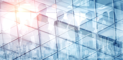 Double exposure image of faded business abstract background with office building and people conference group meeting showing partnership success of business deal.