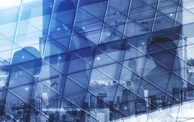 Double exposure image of faded business abstract background with office building and people...