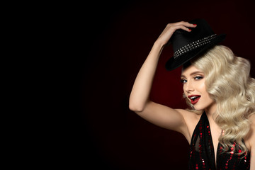Portrait of beautiful young woman with fashion hat