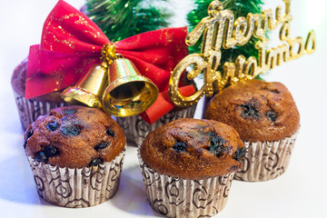 Muffins with Golden bell and Merry Christmas