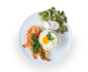 Spicy fried shrimp with basil and chili, serve with rice and egg in white ceramic plate, isolated background, Thai style food.