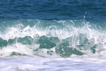 Beautiful turquoise wave in Mediterranean Sea, Greece