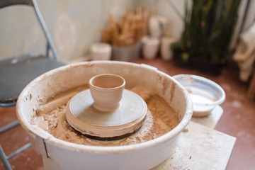 Pottery wheel with clay pot, nobody