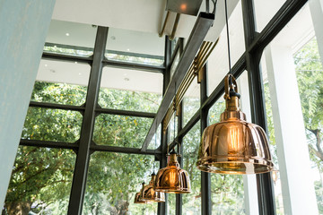 Bronze hanging lights bulb on restaurant