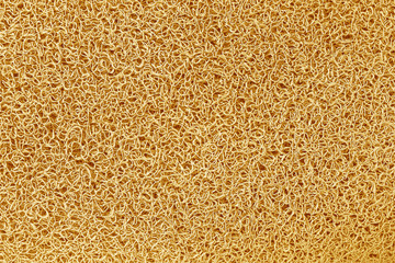 yellow rubber doormat texture background