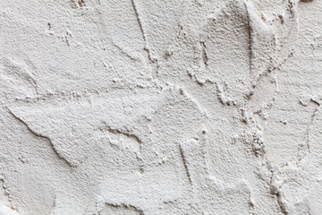 Decorative grey cement plaster on wall
