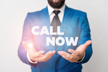Text sign showing Call Now. Business photo showcasing To immediately contact a demonstrating using...