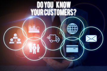 Conceptual hand writing showing Do You Know Your Customers Question. Concept meaning having a great background about clients Male wear formal suit presenting presentation smart device