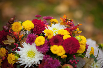 Bouquet of autumn flowers on the table in rustic style. Autumn Time