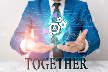 Writing note showing Together. Business concept for In proximity,union or collison with another...