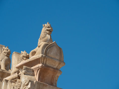 Statue of Chinthe or Leogryph, decorated on the roof of Ananda Temple, Myanmar. . Chinthe or Singha always seen in temples in Myanmar as guardian.