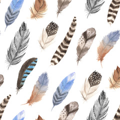 Seamless pattern with isolated watercolor feathers