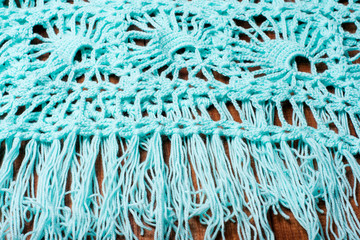 Handmade macrame yarn on wooden table, hobby and creativity concept