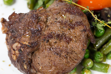 Grilled beef ribs closeup.