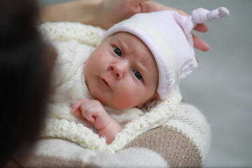 Baby newborn sleeping wrapped up in a blanket