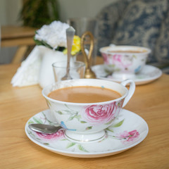 A cup of milk tea on a table