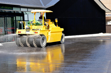 Heavy equipment "tire roller" paving the road