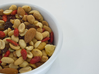 nuts in bowl on white background