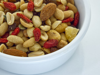 nuts in bowl on white background