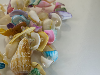 shells and beads on white background