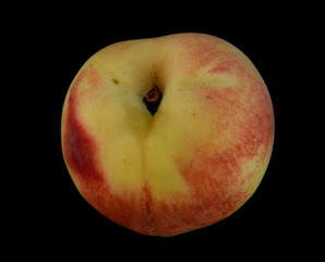 peach isolated on black background