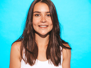 Young beautiful woman looking at camera. Trendy girl in casual summer clothes. Funny and positive...