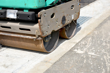 Heavy machine "road roller" paving the road