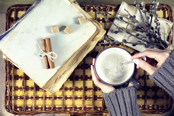 woman drinking coffee and looking at the card Valentine's Day