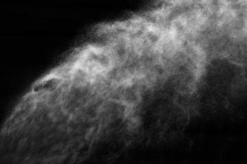 A stream of water and a cloud of drops