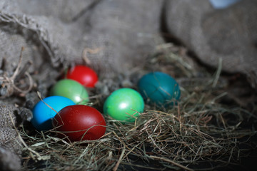 Easter painted eggs on burlap