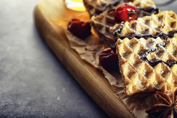 Sweet dessert with waffles and berries for tea at work.