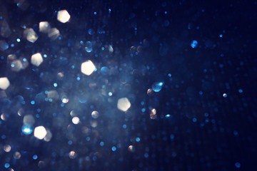 abstract glitter silver and blue lights background. de-focused