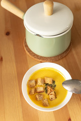 pumpkin cream soup with croutons.